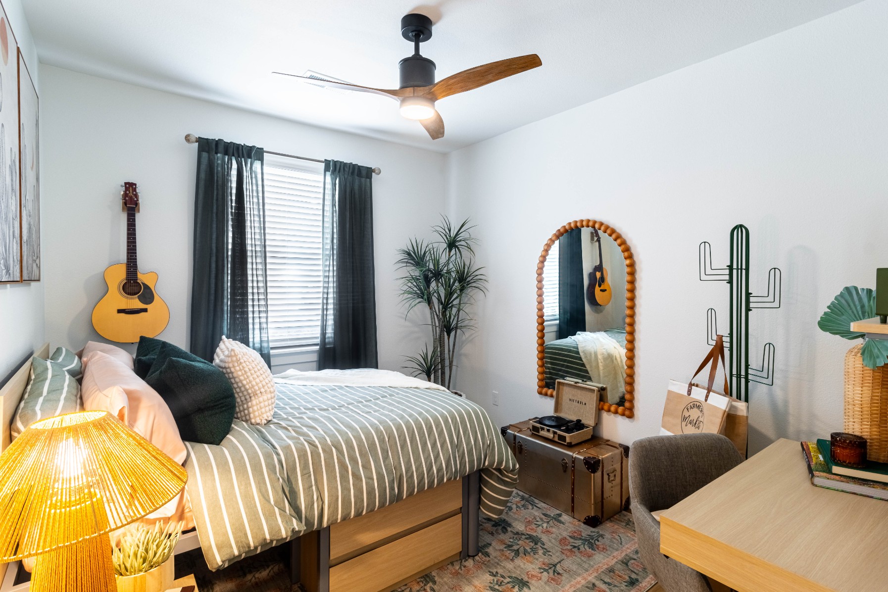 Bedroom in a premium model apartment at Pointe San Marcos