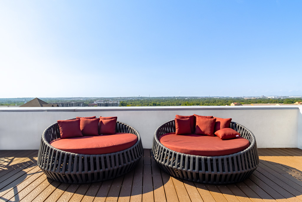 Comfy lounge area on the rooftop terrace at Pointe San Marcos