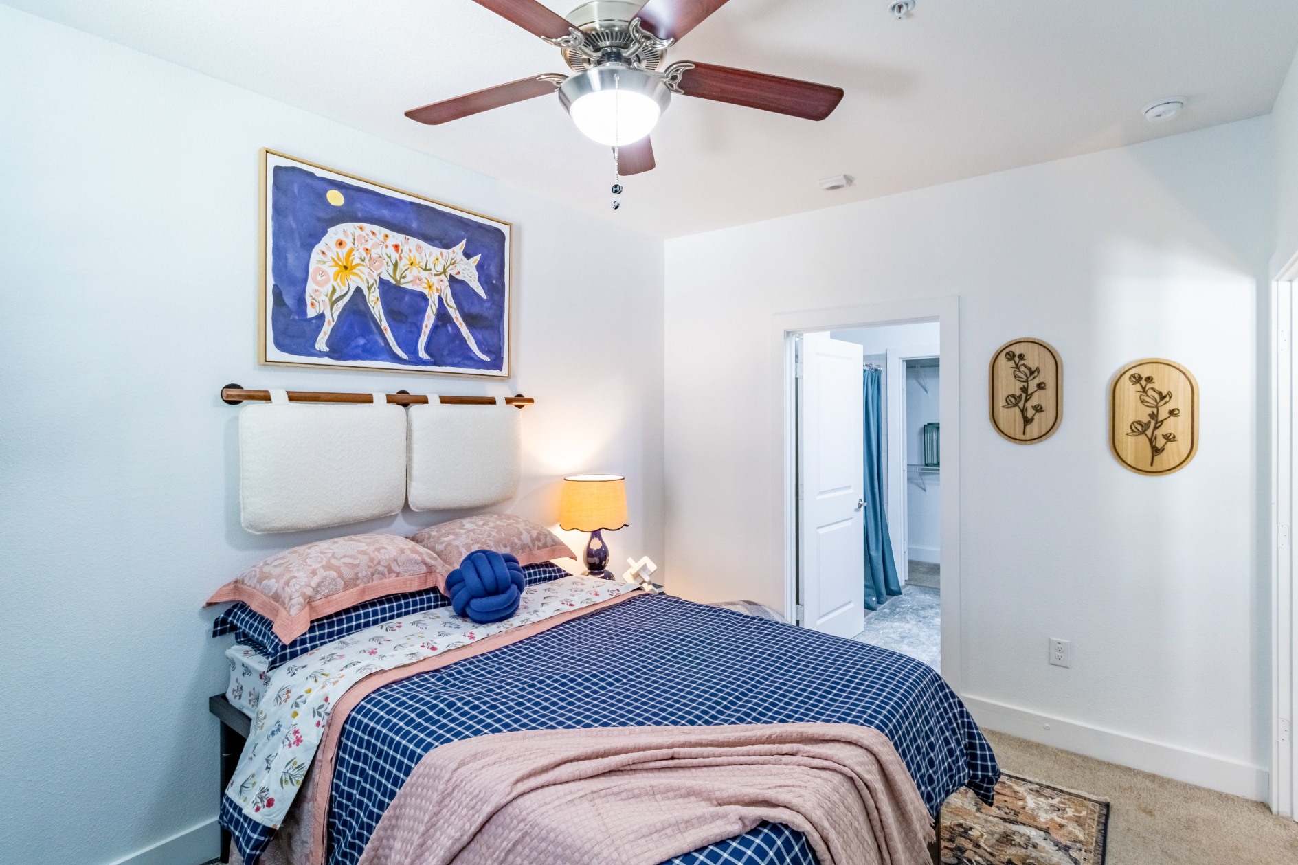 Model bedroom with private bathroom at Pointe San Marcos