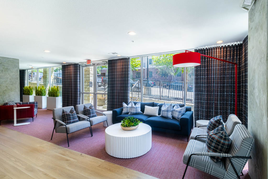 Resident lounge with sofas at Pointe San Marcos