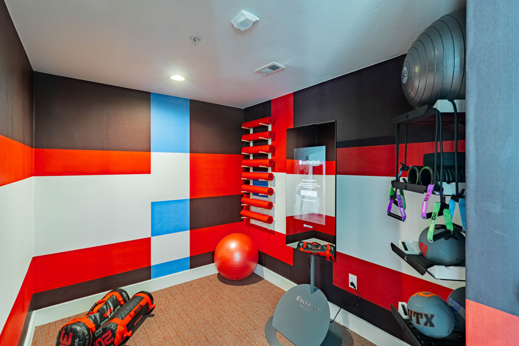 State of the art fitness center with Echelon fit mirror at Pointe San Marcos